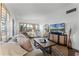 Bright and airy living room showcasing modern décor, wooden shutters, and a comfortable layout at 3211 Harrison, Orlando, FL 32804