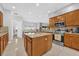 Modern kitchen with stainless steel appliances, granite countertops, and a center island at 36525 Reserve Dr, Eustis, FL 32736