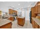 Well-equipped kitchen with granite countertops, stainless steel appliances, and a center island for added workspace at 36525 Reserve Dr, Eustis, FL 32736