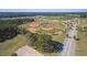 Scenic aerial shot of baseball fields, showcasing well-maintained facilities and spacious parking at 3978 Old Dunn Rd, Apopka, FL 32712