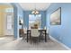 Light-filled dining area featuring a modern table and chairs, creating a cozy atmosphere at 3978 Old Dunn Rd, Apopka, FL 32712