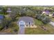 Inviting single-Gathering home featuring a well-manicured lawn and brick-paved driveway at 3978 Old Dunn Rd, Apopka, FL 32712