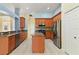 Kitchen featuring granite counters, stainless steel appliances, and ample cabinet space at 3978 Old Dunn Rd, Apopka, FL 32712