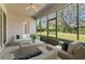 Screened lanai featuring cozy outdoor furniture at 3978 Old Dunn Rd, Apopka, FL 32712