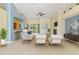 Bright and airy living room with tile flooring, a fireplace, and an open layout at 3978 Old Dunn Rd, Apopka, FL 32712