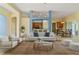 Open-concept floor plan that seamlessly connects the living room, kitchen, and dining areas at 3978 Old Dunn Rd, Apopka, FL 32712