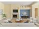 Bright living room boasts a fireplace and ample natural light at 3978 Old Dunn Rd, Apopka, FL 32712
