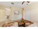 Bright living room featuring wood floors and double door closet at 3978 Old Dunn Rd, Apopka, FL 32712