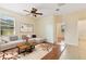 Comfortable living room featuring an L-shaped couch and natural light at 3978 Old Dunn Rd, Apopka, FL 32712