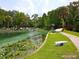 Beautiful view of Rock Springs with clear water and surrounding trees at 3978 Old Dunn Rd, Apopka, FL 32712