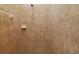 Shower featuring neutral ceramic tile, and built in soap dish at 3978 Old Dunn Rd, Apopka, FL 32712