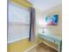 Charming bedroom nook with bright decor, and natural lighting at 5300 S Atlantic Ave # 6-206, New Smyrna Beach, FL 32169