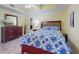 Inviting bedroom with a ceiling fan and lots of storage space at 5300 S Atlantic Ave # 6-206, New Smyrna Beach, FL 32169