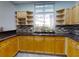 Well-equipped community kitchen with ample counter space and modern appliances at 5300 S Atlantic Ave # 6-206, New Smyrna Beach, FL 32169