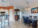 Inviting dining area open to the kitchen and hutch; ideal for entertaining guests and Gathering meals at 5300 S Atlantic Ave # 6-206, New Smyrna Beach, FL 32169
