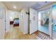 Inviting condo entrance leading to a bedroom and featuring beach themed decor at 5300 S Atlantic Ave # 6-206, New Smyrna Beach, FL 32169