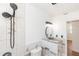 Bathroom with custom tile, vanity, and a dual shower head at 5508 Meridian Way, Orlando, FL 32808