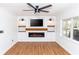 Cozy living room with fireplace and built-in shelves at 5508 Meridian Way, Orlando, FL 32808
