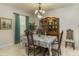 Dining room featuring a wooden hutch and a floral tablecloth at 619 Meadow Sage Dr, Deland, FL 32724