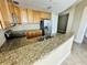 Kitchen with stainless steel appliances and granite countertops at 101 S Eola Dr # 921, Orlando, FL 32801