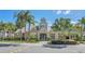 Community clubhouse with elegant architecture and landscaping at 1043 S Hiawassee Rd # 3125, Orlando, FL 32835