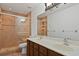 Bathroom featuring a vanity with double sinks and a walk in shower at 1157 Schooner Dr, Kissimmee, FL 34744