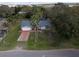 Street view of house featuring front yard and driveway at 1157 Schooner Dr, Kissimmee, FL 34744