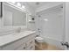 Clean bathroom featuring a shower-tub combo and marble sink vanity at 1188 La Mesa Ave, Winter Springs, FL 32708