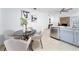 Kitchen featuring eat-in dining nook, stainless dishwasher, and stylish lighting at 1188 La Mesa Ave, Winter Springs, FL 32708