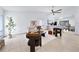 Bright living room with vaulted ceiling, neutral colors, and tile floors at 1188 La Mesa Ave, Winter Springs, FL 32708