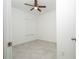 Bedroom with ceiling fan and tiled floors at 13283 Sw 30Th Terrace Rd, Ocala, FL 34473