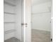 Walk-in closet with wire shelving provides ample storage space at 13283 Sw 30Th Terrace Rd, Ocala, FL 34473