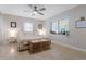 Well-lit main bedroom features neutral walls, ceiling fan, and lots of light at 1456 Helena Ct, Deltona, FL 32725