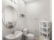 Clean half bathroom with pedestal sink and modern fixtures at 1547 Carey Palm Cir, Kissimmee, FL 34747