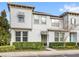 Beautiful two-story townhome with a well-manicured lawn at 1547 Carey Palm Cir, Kissimmee, FL 34747