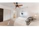 Bedroom features neutral carpet, ceiling fan, and ensuite bathroom at 1585 Chestnut Ave, Winter Park, FL 32789