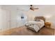 Cozy bedroom featuring soft carpet, a ceiling fan, and natural light at 1585 Chestnut Ave, Winter Park, FL 32789