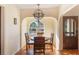 Inviting breakfast nook with a charming chandelier and a view of the outdoors at 1585 Chestnut Ave, Winter Park, FL 32789