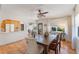 Well-lit dining room with a view to the kitchen, tile flooring, and neutral colors at 1585 Chestnut Ave, Winter Park, FL 32789