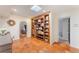 Spacious foyer with built-in shelving and unique tile flooring at 1585 Chestnut Ave, Winter Park, FL 32789