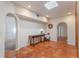 Stylish foyer with arches, console table, and lots of natural light at 1585 Chestnut Ave, Winter Park, FL 32789