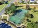 Aerial view of a well-maintained community tennis court for active lifestyles at 1990 Appalachee Cir, Tavares, FL 32778