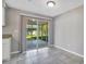 Bright dining area with sliding glass doors leading to a screened patio at 210 Cadillac Ct, Altamonte Springs, FL 32701