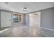 Inviting living room with tile flooring, ample natural light, and neutral paint at 210 Cadillac Ct, Altamonte Springs, FL 32701