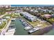 Beautiful aerial view of condos overlooking the intercostal waterway and private boat slips with ocean in the background at 2100 N Peninsula Ave # 1020, New Smyrna Beach, FL 32169