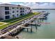 Building exterior view with boat slip and waterfront access at 2100 N Peninsula Ave # 1020, New Smyrna Beach, FL 32169