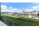 Bedroom window view of the water and docks at 2100 N Peninsula Ave # 1020, New Smyrna Beach, FL 32169