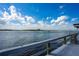 Relax on the waterfront deck with scenic water views, seating, and a serene atmosphere at 2100 N Peninsula Ave # 1020, New Smyrna Beach, FL 32169