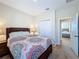 Spacious bedroom with carpet, closet, and a view into another bedroom at 2687 Chantilly Ave, Kissimmee, FL 34741