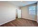 Bedroom featuring a closet and a large window, neutral carpeting, and natural light at 2687 Chantilly Ave, Kissimmee, FL 34741